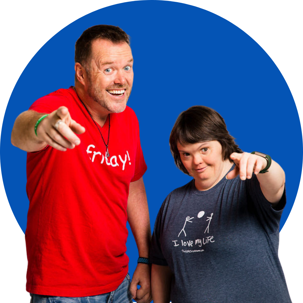 Julie and Derrick showing off the new shirts.